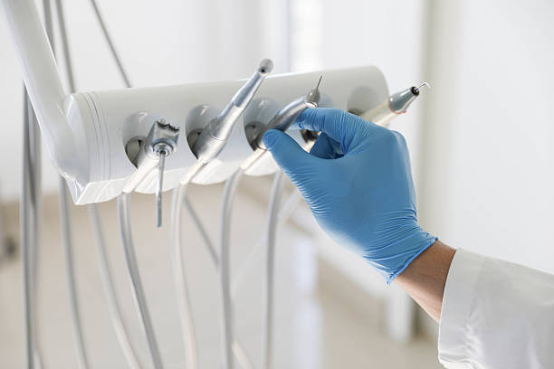 Professional Dental Crowns And Bridges technician working in Roosevelt Park, MI